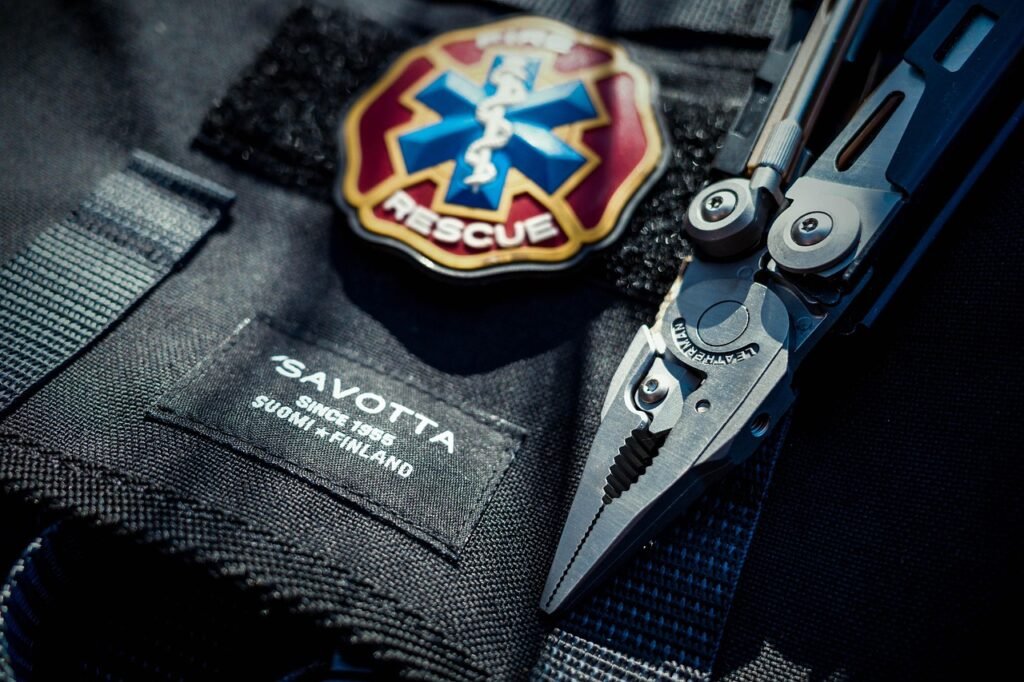 close-up of a multi-tool with rusted pliers and dull knife blade